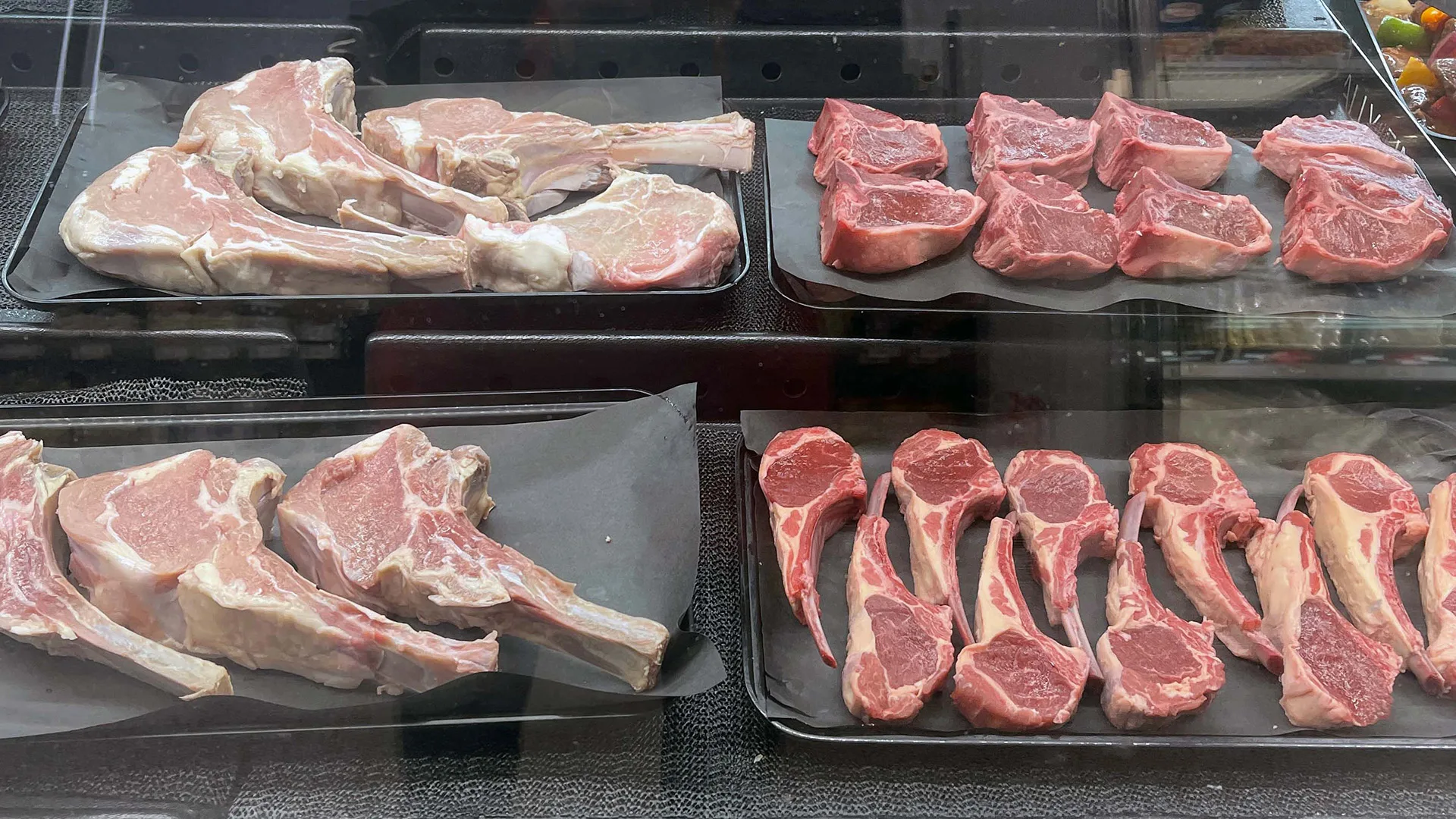lamb chops, lamb loins, and lamb products on display